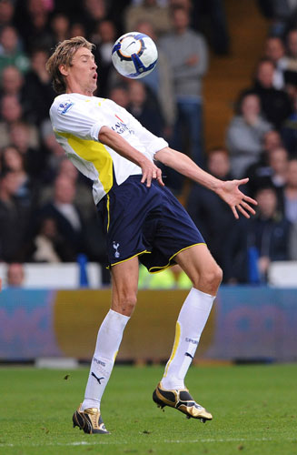 Saturday Prem Roundup: Tottenham's Peter Crouch chests the ball down 