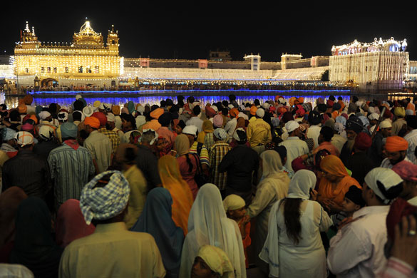 Diwali: Sikh devotees pay their respects at the illuminated Golden Temple