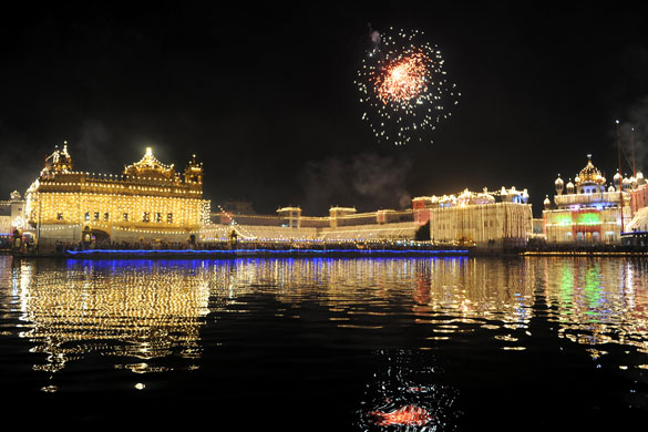 Diwali: Fireworks above the illuminated Golden Temple in Amritsar, India
