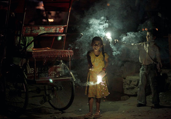 Diwali: Children light fireworks in New Delhi, India