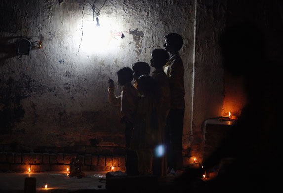 Diwali: Children watch fireworks in New Delhi, India