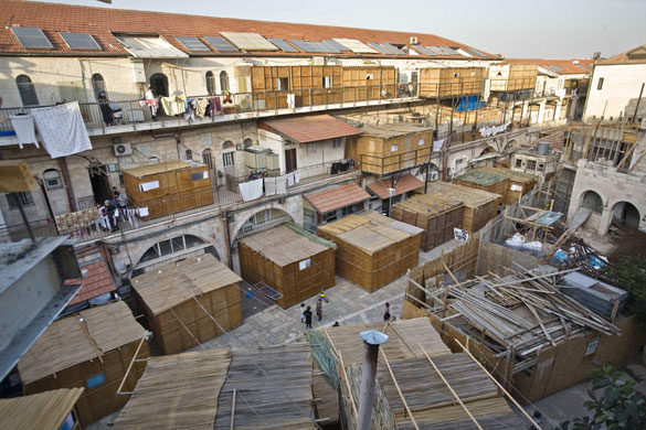 2 October 2009: Jerusalem: Ultra-Orthodox Jewish children play between Sukkahs