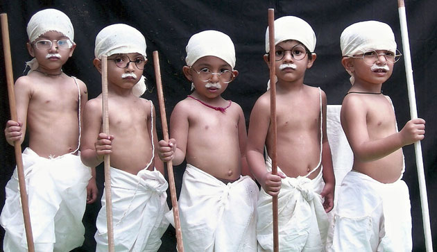 2 October 2009: Bhopal, India; School children dressed as Mahatma Gandhi