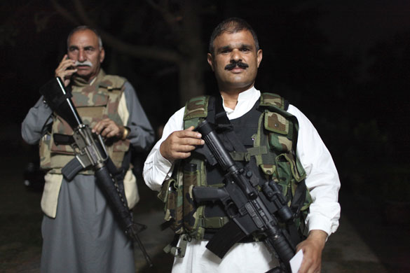 Swat Valley: Jamal Nasir Khan the Mayor of Swat, armed with an American M-4 rifle