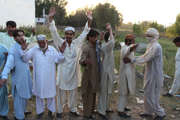 Swat Valley: Pakistani army intelligence officer searches for weapons and explosives