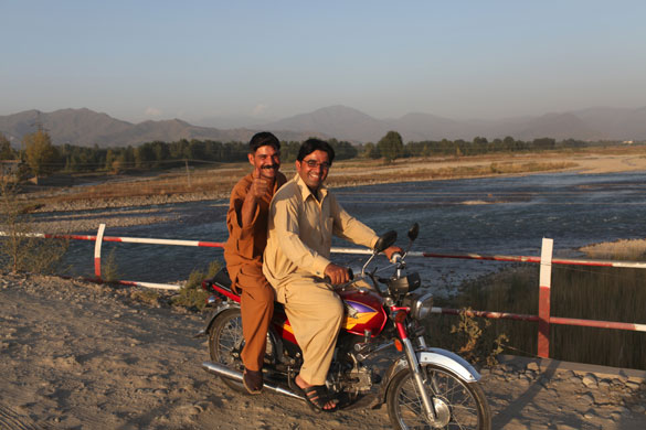 Swat Valley: People crossing the Ayub bridge outside Mingora, Swat Valley