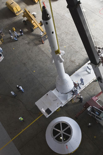 Ares I-X :  Crew Module simulator in a stacking test in the NASA Langley hangar