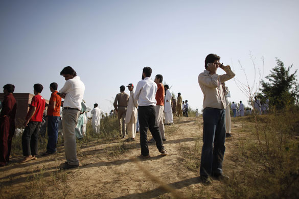 Islamabad suicide bomb: People gather outside the Islamic University