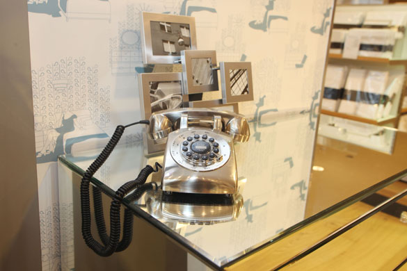 Poole John Lewis: A photograph frame and telephone