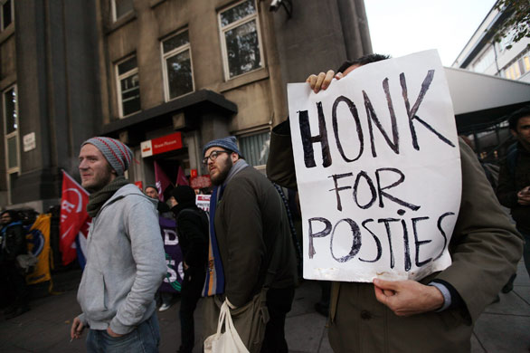 Postal strike: London:  Royal Mail employees form a picket line outside Mount Pleasant