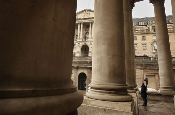 Recession 2009: A man stands near of The Bank of England