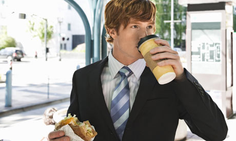Businessman eating on the go