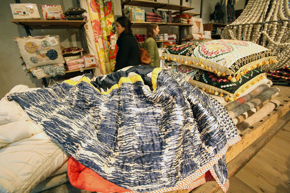 Anthropologie London: Throws and cushions on display