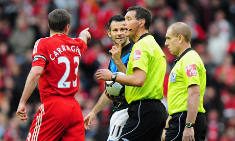Liverpool gallery: Jamie Carragher and Ryan Giggs have words with referee Andre Marriner