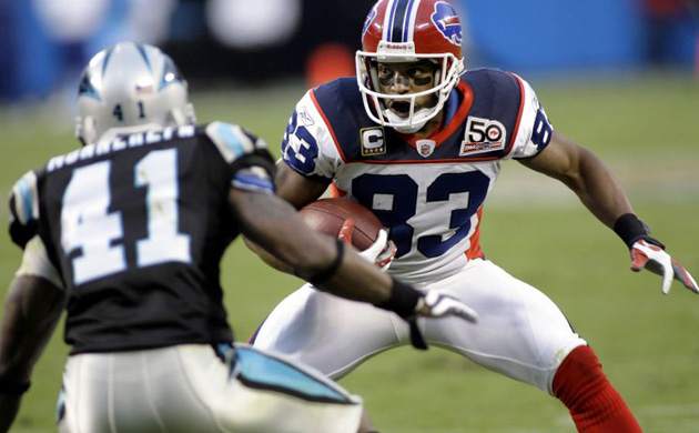 <b>Buffalo Bills 20, Carolina Panthers 9:</b>  Bills wide receiver Lee Evans runs after a catch as Panthers cornerback Captain Munnerlyn defends. Despite outgaining the Bills (3-4) by a ratio of early three-to-one, the Panthers (2-4) still managed to lose.  Quarterback Jack Delhomme threw three interceptions and Kenny Moore fumbled a punt as the Panthers racked up four turnovers