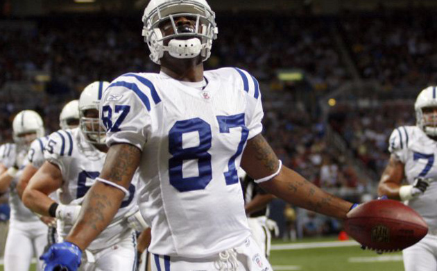 <b>Indianapolis Colts 42, St Louis Rams 6: </b> Colts wide receiver Reggie Wayne celebrates after scoring a touchdown in the first quarter. The unbeaten Colts (6-0) proved to be way too much for the winless Rams as Peyton Manning passed for 235 yards and three touchdowns. The Colts won their 15th straight regular-season game and set a franchise record with their eighth straight road victory.  The Rams lost their 17th straight regular-season game despite running back Steven Jackson's 134 yards