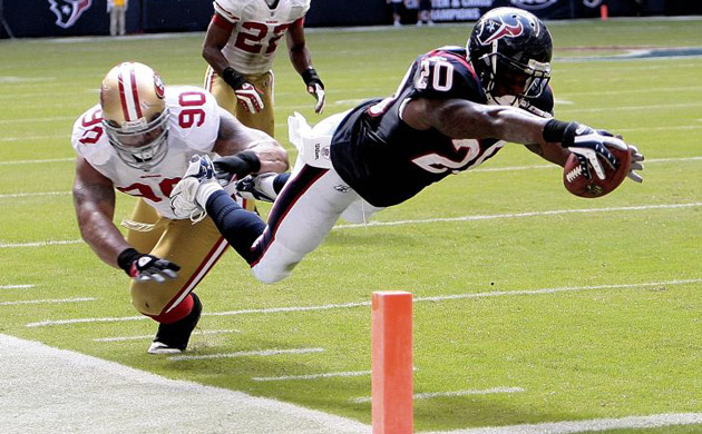 <b>Houston Texans 24, San Francisco 49ers 21:</b>  Texans running back Steve Slaton dives for a touchdown. The Texans (4-3) built a 21-0 lead at the half but the 49ers (3-3) rallied behind backup quarterback Alex Smith. Smith threw three touchdowns in the second half but it wasn't enough. The Texans just needed a field goal in the fourth quarter to secure their fourth win of the season