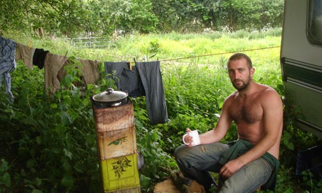 Mark Boyle outside his caravan.