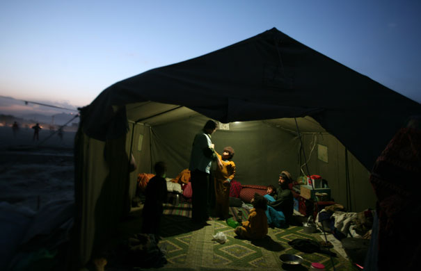 27 October 2009: Kabul, Afghanistan: An internally displaced family inside their tent