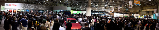 Tokyo motorshow: members of the media crowd in for the much anticipated Toyota presentation
