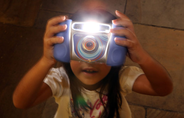Top toys: Charlize, 8, plays with the Kidizoom Multimedia Digital Camera
