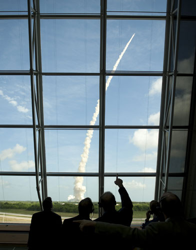 Ares rocket launch: NASA Ares I-X mission managers watch as NASA's Ares I-X rocket launches 
