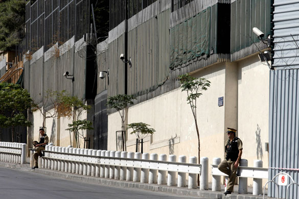 US embassies: Syrian security men stand guard outside the US embassy in Damascus in 2008