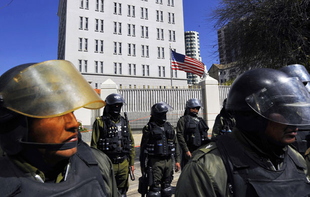 US embassies: Bolivian riot police stand guard outside the US embassy in La Paz