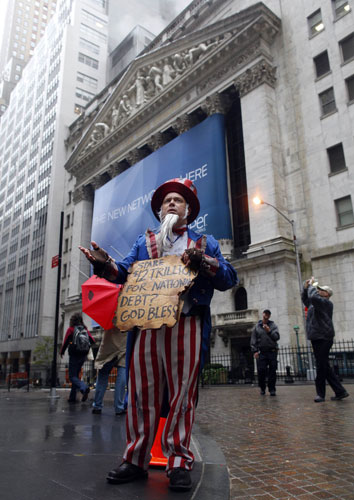 Week in business: A man dressed as Uncle Samoutside the New York Stock Exchange