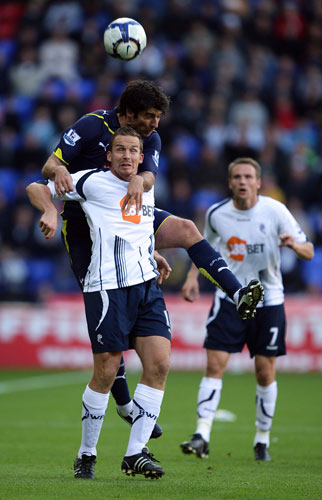 Saturday Premiership: Vedran Corluka climbs all over Kevin Davies to win the header