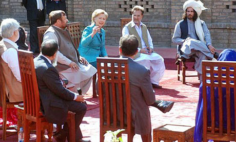 Hillary Clinton, the US secretary of state, talks to tribesmen from Pakistan's north-western areas in Islamabad.