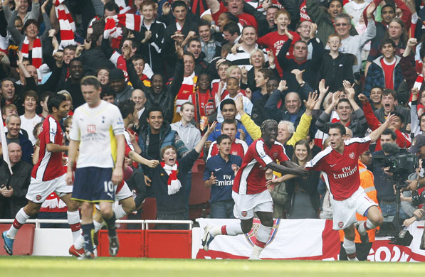 Arsenal v Tottenham: Robin van Persie celebrates after scoring Arsenal's first goal