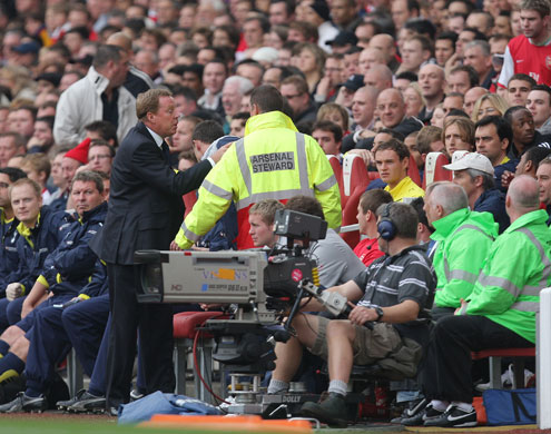 Arsenal v Tottenham: Harry Redknapp calls in a steward after being abused by the Arsenal fans