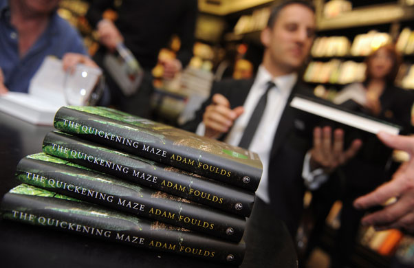 Man Booker 2009: Shortlisted author Adam Foulds signs copies of his book The Quickening Maze