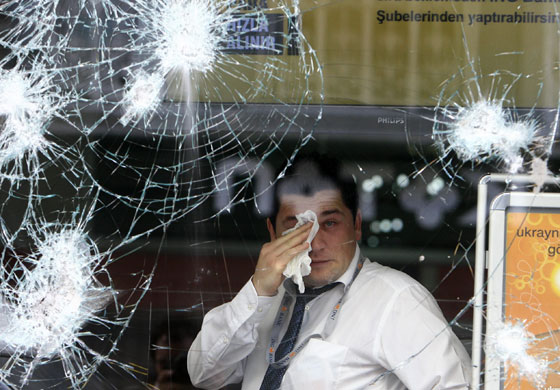 7 October 2009: Istanbul, Turkey: A man affected by tear gas