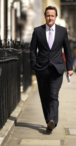 Top Ten Tories: Conservative Party leader David Cameron arrives for a press conference 