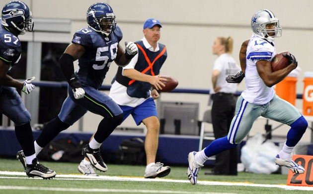 Sam Hurd of the Dallas Cowboys player runs for a touchdown against the Seattle Seahawks