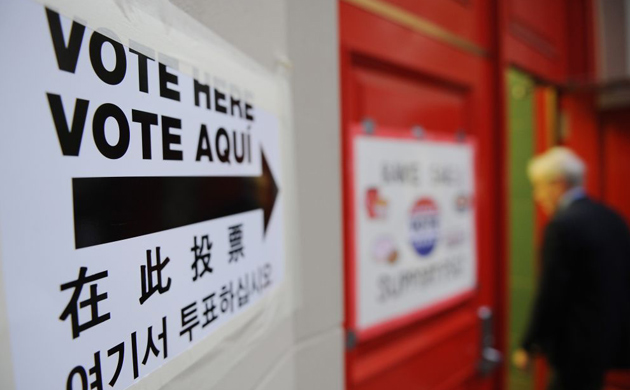 A man enters a polling station in New York