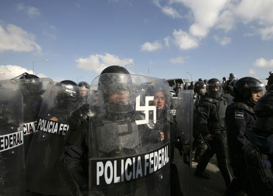24 hours: A police officer with a swastika on his shield in Mexico city
