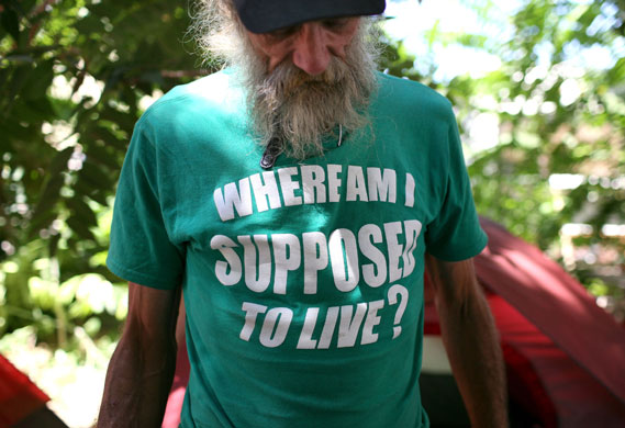 Homelessness: Homeless man John Kraintz stands in front of his tent