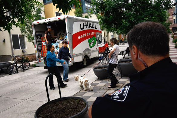 Homelessness: Sheriff's deputy Rick Ferguson supervises as renters load up a moving truck