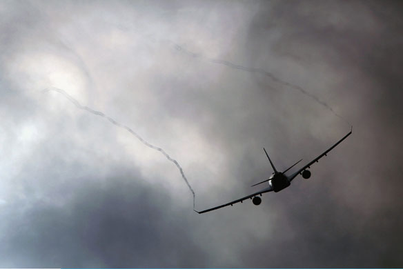 24 Hours in Pix: A British Airways flight departs Heathrow Airport