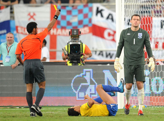 Brazil v England: England goalkeeper Ben Foster receives a yellow card