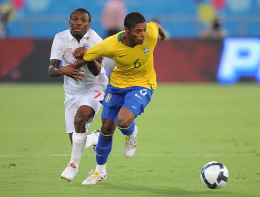 Brazil v England: Shaun Wright-Phillips tussles with Brazil's Fernandes Michel Bastos 