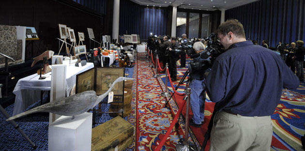 Madoff auction: The media photographs hundreds of items
