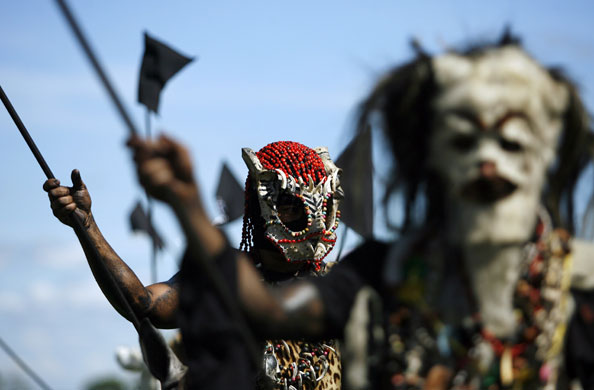 24 hours in pictures: San Martin, Colombia: Performers take part in a traditional folk festiva