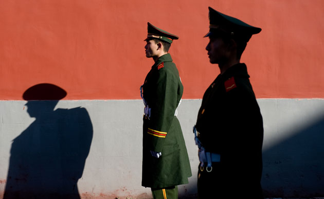 17 November 2009: Beijing, China: Memebers of the police stand guard