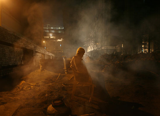 24 hours in pictures: A night watchman in Mumbai