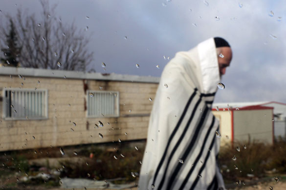 24 hours in pictures: Ultra Orthodox Jewish man in Beitar Illit