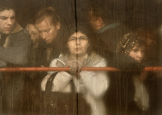 24 hours in pictures: Bucharest, Romania: a crowded tram during a strike by subway workers